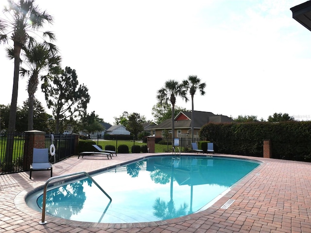 8941 SW 73rd Ln, Gainesville, FL 32608 - community pool featuring a patio