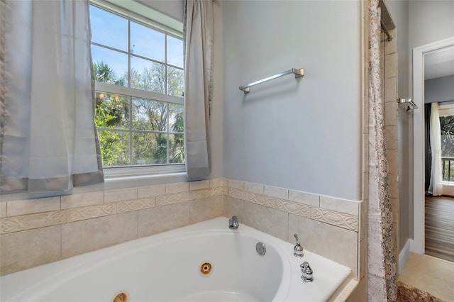bathroom with a jetted tub