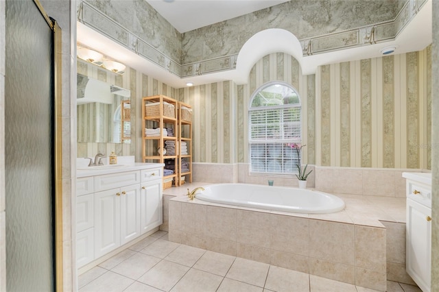 3802 SW 93rd Ter, Gainesville, FL 32608 - full bathroom featuring wallpapered walls, a bath, vanity, and tile patterned flooring
