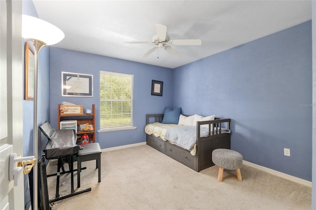 3802 SW 93rd Ter, Gainesville, FL 32608 - carpeted bedroom with baseboards and a ceiling fan