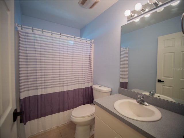 full bathroom with vanity, a shower with curtain, visible vents, toilet, and tile patterned floors