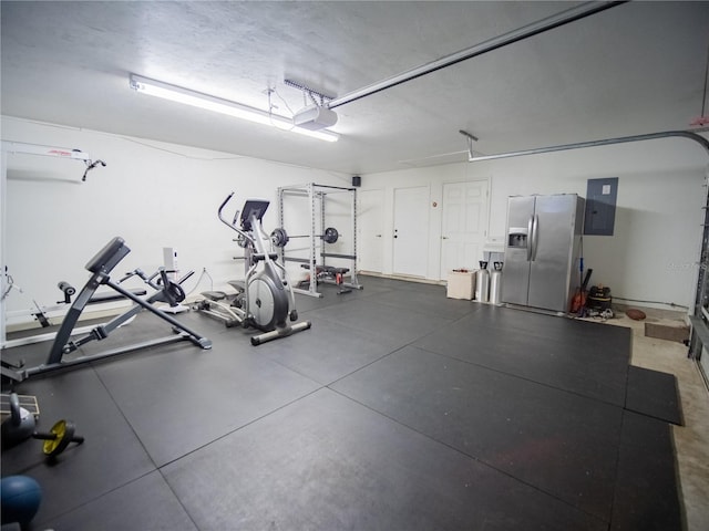 interior space featuring a garage and electric panel