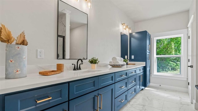 10055 Fox Hollow Dr, Hampton, FL 32044 - bathroom featuring a sink, double vanity, and marble finish floor