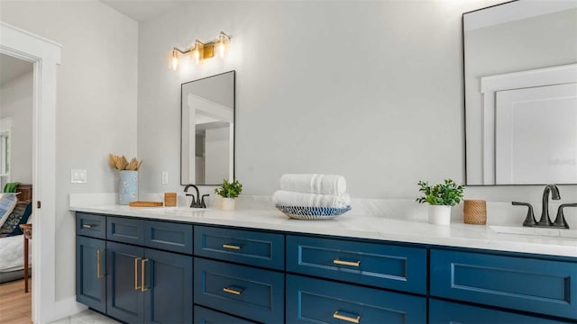 10055 Fox Hollow Dr, Hampton, FL 32044 - ensuite bathroom featuring double vanity, a sink, and connected bathroom