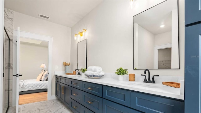 10055 Fox Hollow Dr, Hampton, FL 32044 - full bathroom with double vanity, connected bathroom, visible vents, marble finish floor, and a sink