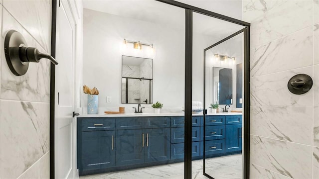 10055 Fox Hollow Dr, Hampton, FL 32044 - full bathroom with a sink, a shower stall, marble finish floor, and double vanity