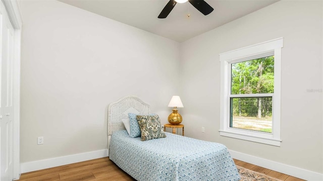 10055 Fox Hollow Dr, Hampton, FL 32044 - bedroom featuring light wood finished floors, baseboards, and a ceiling fan