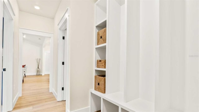 10055 Fox Hollow Dr, Hampton, FL 32044 - mudroom featuring light wood-type flooring and baseboards