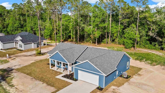 10055 Fox Hollow Dr, Hampton, FL 32044 - birds eye view of property with a forest view