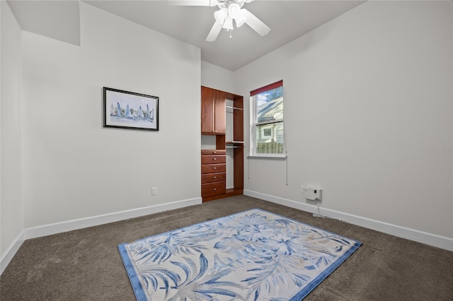 6382 SW 48th Dr, Gainesville, FL 32608 - bedroom featuring dark colored carpet and ceiling fan