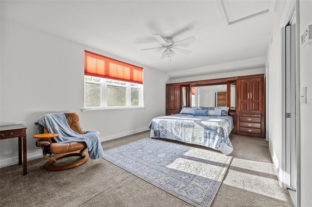 6382 SW 48th Dr, Gainesville, FL 32608 - bedroom featuring light carpet, attic access, and ceiling fan