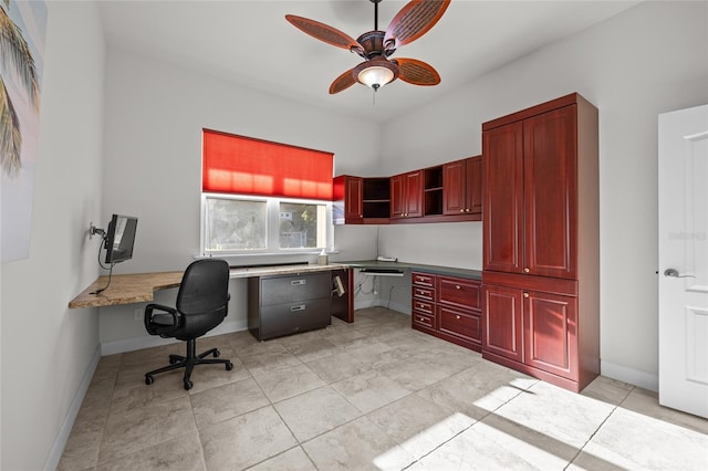 6382 SW 48th Dr, Gainesville, FL 32608 - office space with built in study area and a ceiling fan