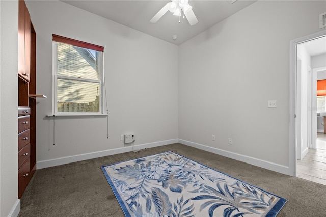 6382 SW 48th Dr, Gainesville, FL 32608 - unfurnished bedroom featuring carpet, vaulted ceiling, and ceiling fan