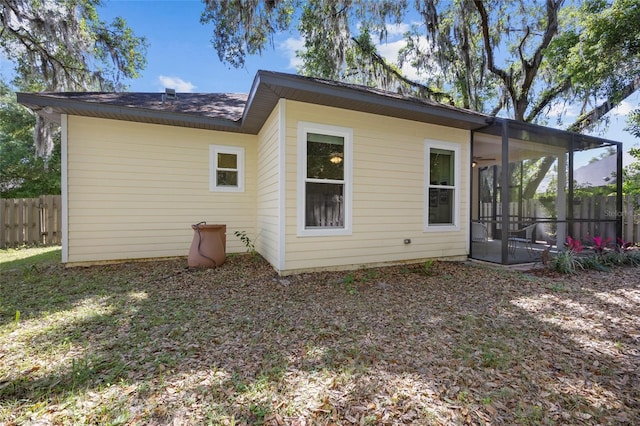 6382 SW 48th Dr, Gainesville, FL 32608 - back of house featuring a sunroom
