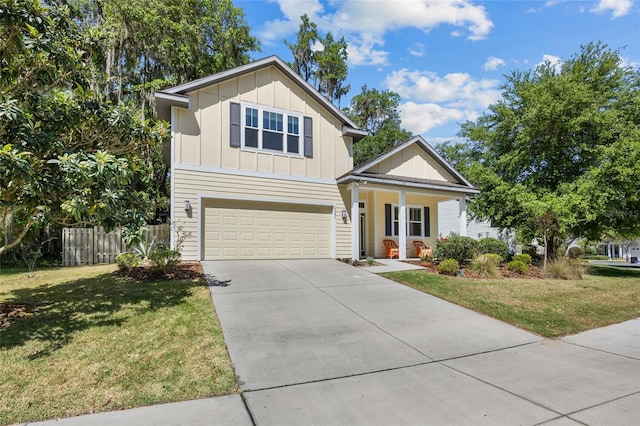 6382 SW 48th Dr, Gainesville, FL 32608 - view of front of house with board and batten siding, concrete driveway, a garage, and a porch
