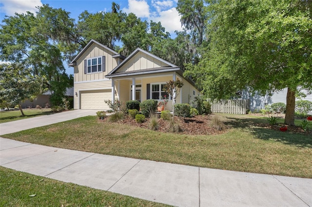 6382 SW 48th Dr, Gainesville, FL 32608 - view of front of home featuring board and batten siding, a garage, concrete driveway, and a porch