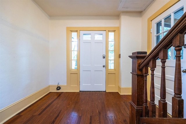 562 NE 2nd Ave, Gainesville, FL 32601 - entrance foyer featuring dark wood-type flooring, plenty of natural light, and stairway
