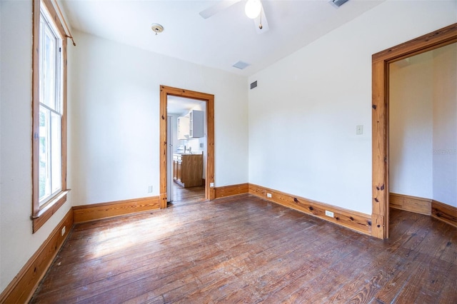 562 NE 2nd Ave, Gainesville, FL 32601 - empty room with wood-type flooring and ceiling fan
