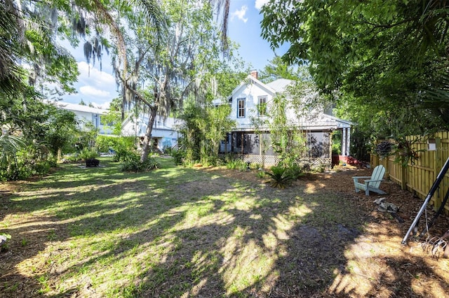 562 NE 2nd Ave, Gainesville, FL 32601 - view of yard featuring a sunroom