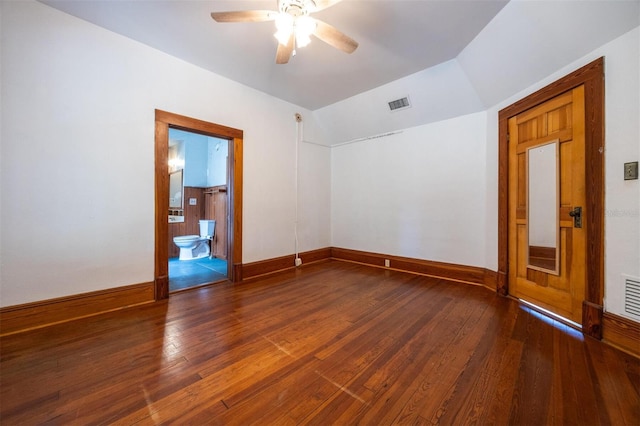 562 NE 2nd Ave, Gainesville, FL 32601 - spare room with ceiling fan, vaulted ceiling, and hardwood / wood-style flooring