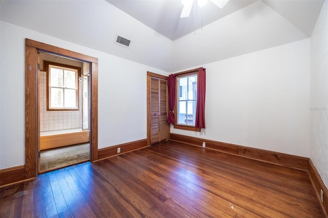 562 NE 2nd Ave, Gainesville, FL 32601 - unfurnished room with wood-type flooring, a ceiling fan, and lofted ceiling