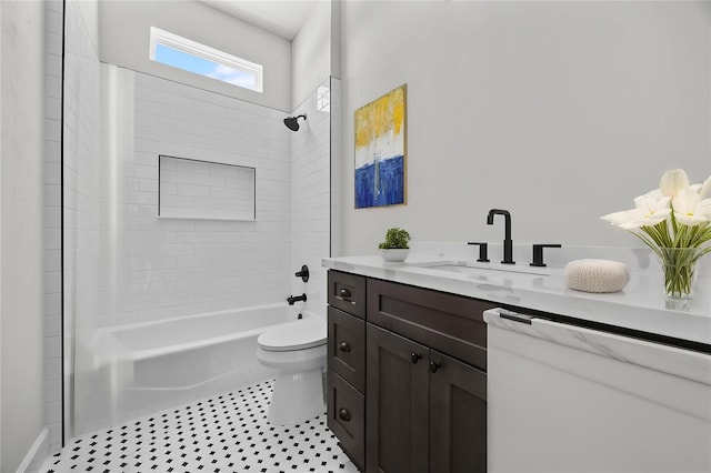 bathroom with shower / bathtub combination, vanity, and toilet