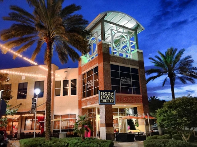 view of property at twilight