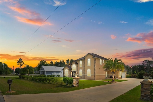 9835 SW 80th Pl, Hampton, FL 32044 - view of front of home featuring a yard and concrete driveway