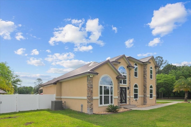 9835 SW 80th Pl, Hampton, FL 32044 - view of side of property featuring a yard, fence, cooling unit, and stucco siding