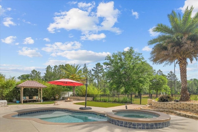 9835 SW 80th Pl, Hampton, FL 32044 - view of swimming pool featuring a gazebo, a patio area, fence, and an in ground hot tub