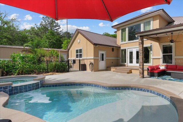 9835 SW 80th Pl, Hampton, FL 32044 - back of house with french doors, a patio area, stucco siding, and fence