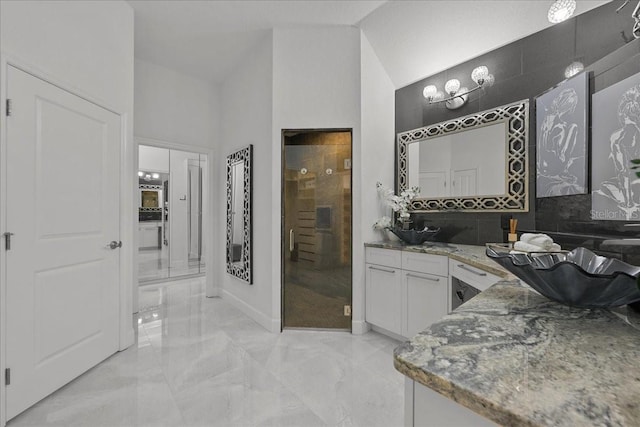 9835 SW 80th Pl, Hampton, FL 32044 - full bathroom with baseboards, a shower stall, vanity, backsplash, and marble finish floor