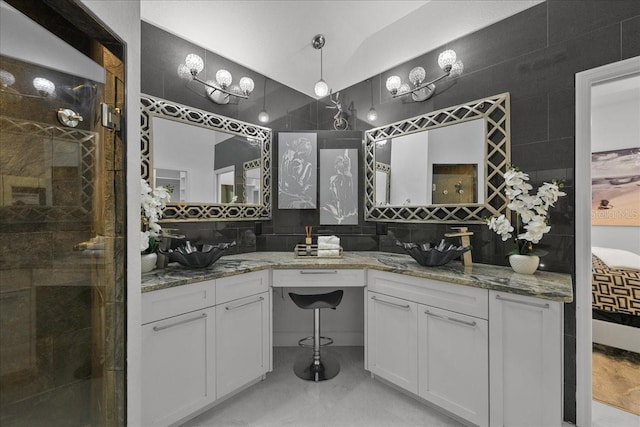 9835 SW 80th Pl, Hampton, FL 32044 - full bathroom with tasteful backsplash, ensuite bathroom, a tile shower, vanity, and finished concrete floors