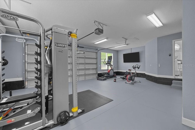 9835 SW 80th Pl, Hampton, FL 32044 - gym featuring a garage and a textured ceiling