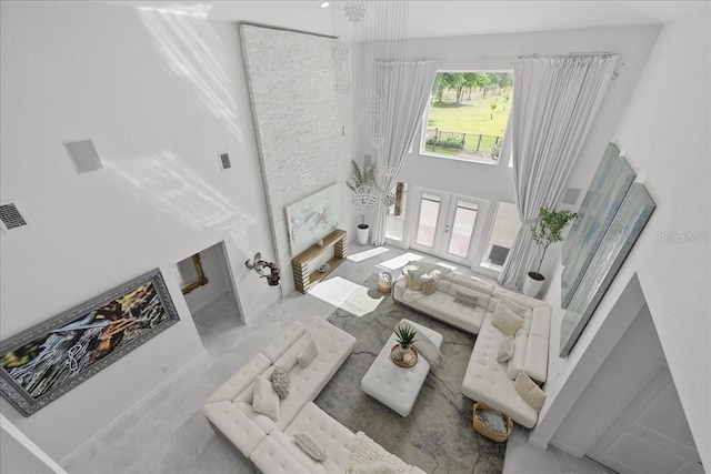 9835 SW 80th Pl, Hampton, FL 32044 - living area featuring a towering ceiling, visible vents, and french doors