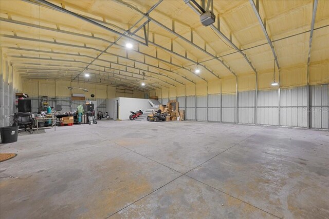 9835 SW 80th Pl, Hampton, FL 32044 - garage featuring a garage door opener