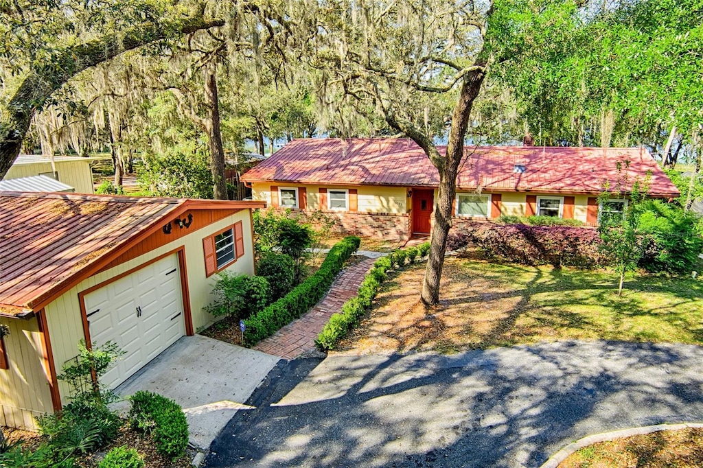 6393 Little Lake Geneva Rd, Keystone Heights, FL 32656 - single story home with a garage