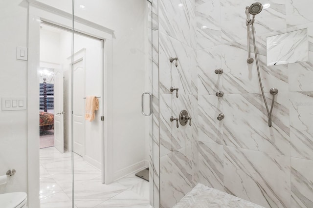full bathroom with connected bathroom, marble finish floor, a marble finish shower, and toilet
