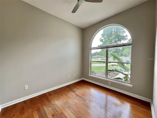 11795 Creek Dr, Alachua, FL 32615 - empty room with baseboards, hardwood / wood-style floors, and ceiling fan