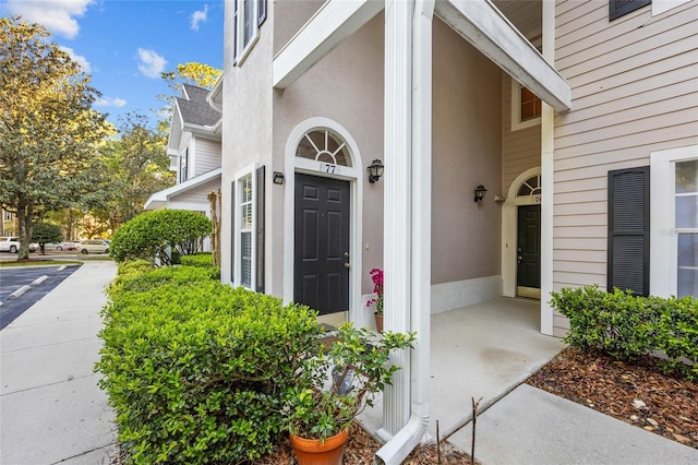 10000 SW 52nd Ave Unit 77, Gainesville, FL 32608 - property entrance featuring stucco siding