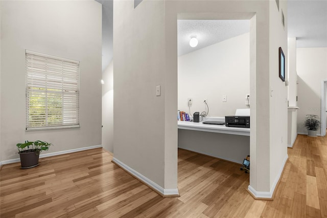 10000 SW 52nd Ave Unit 77, Gainesville, FL 32608 - hall with light wood-type flooring and baseboards