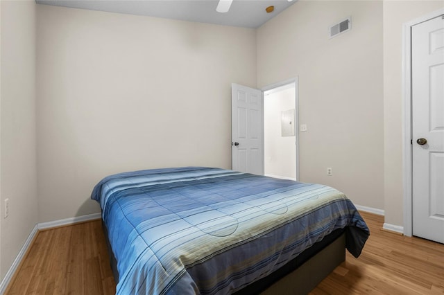 10000 SW 52nd Ave Unit 77, Gainesville, FL 32608 - bedroom featuring wood finished floors, ceiling fan, baseboards, and visible vents
