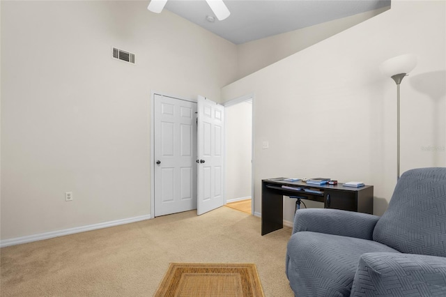 10000 SW 52nd Ave Unit 77, Gainesville, FL 32608 - living area with carpet, a ceiling fan, vaulted ceiling, visible vents, and baseboards