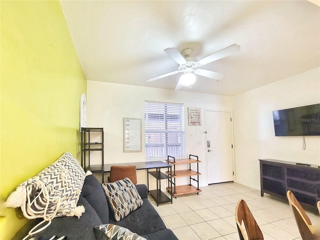 tiled living room with ceiling fan