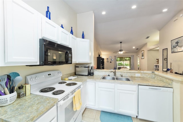 3118 NW 79th Ct, Gainesville, FL 32606 - kitchen featuring white appliances, a sink, a peninsula, white cabinets, and ceiling fan