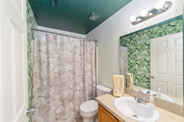 3118 NW 79th Ct, Gainesville, FL 32606 - full bathroom with toilet, vanity, wallpapered walls, and a shower with shower curtain