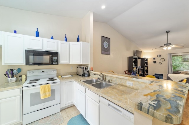 3118 NW 79th Ct, Gainesville, FL 32606 - kitchen with white appliances, a sink, a peninsula, vaulted ceiling, and a ceiling fan