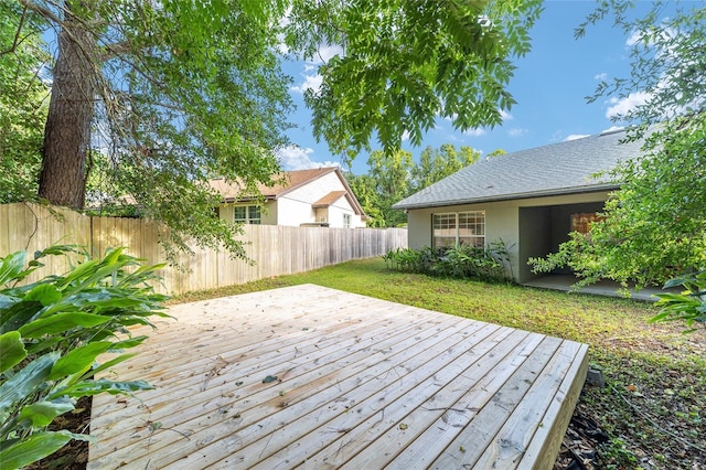 3118 NW 79th Ct, Gainesville, FL 32606 - wooden deck with a fenced backyard