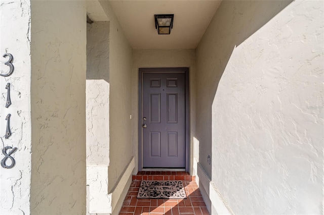 3118 NW 79th Ct, Gainesville, FL 32606 - property entrance with stucco siding