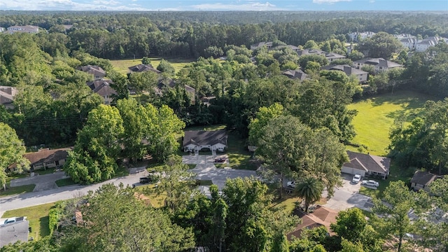 3118 NW 79th Ct, Gainesville, FL 32606 - aerial overview of property's location with a heavily wooded area and nearby suburban area